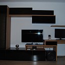 Furniture made of chipboard with black glass